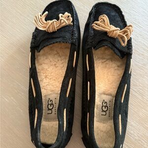 UGG Black Suede Moccasins with Tan Bow